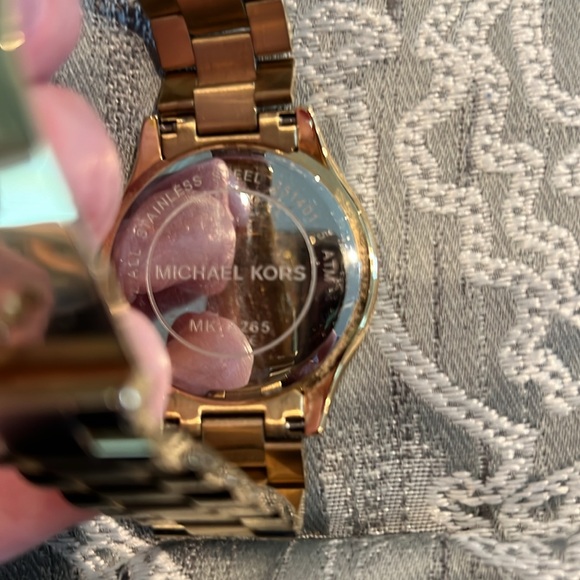 Michael Kors gold watch with blue face. - Picture 2 of 7
